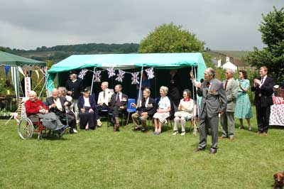 Colonel Jimmy Evans opens the F�te along with Froyle's World War Two veterans.