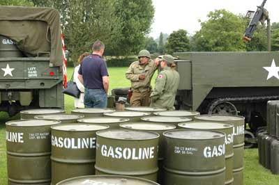 Members of the 514th QM Truck Regiment show their equipment to visitors to the f�te 