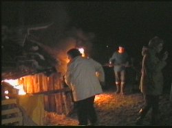 Anne Wetherall lights the bonfire